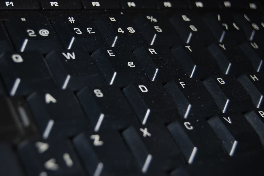 An illustrative close-up photograph of a computer keyboard, taken in 2011.