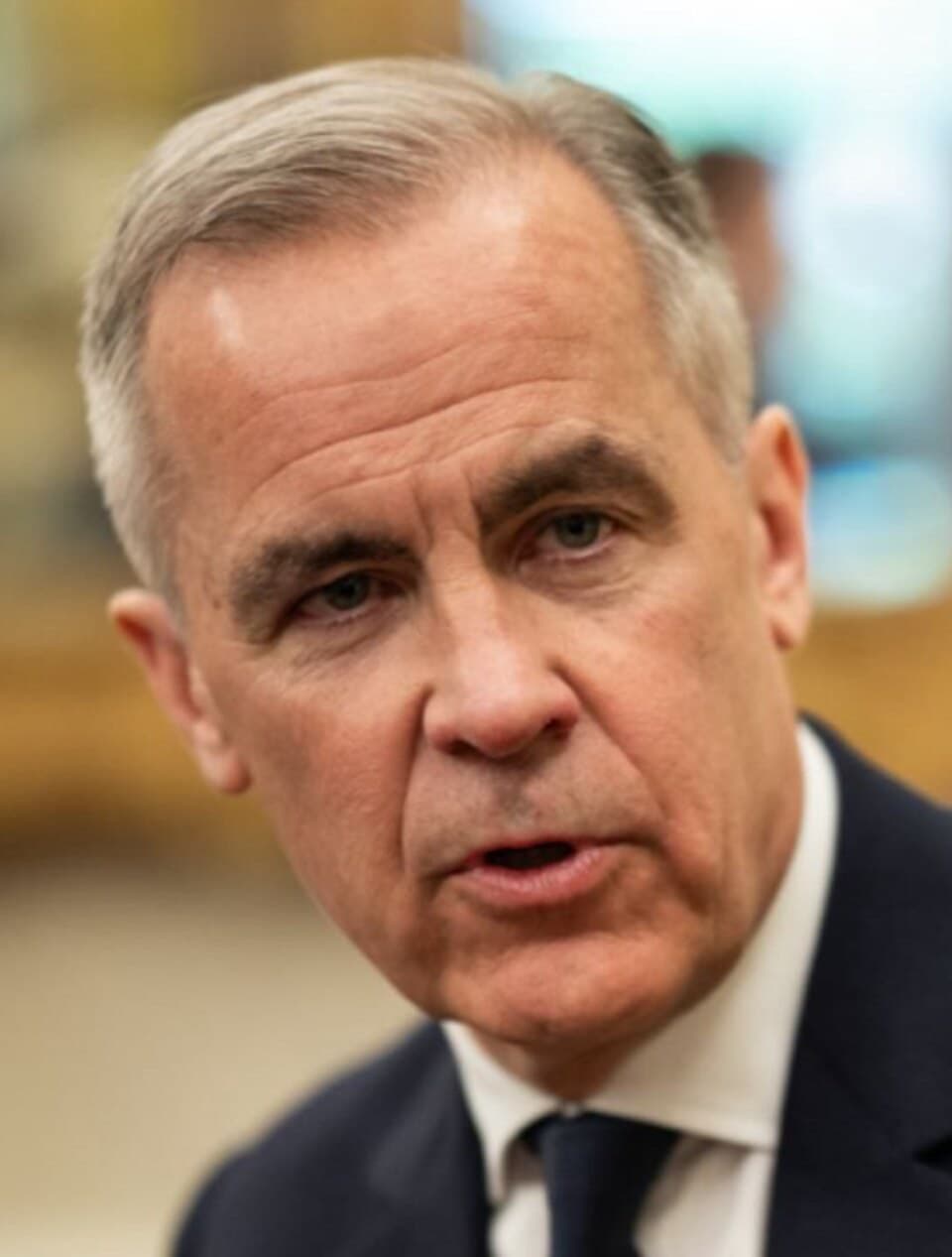 Archive photograph of Mark Carney at White House, May 6, 2025. Not the October 21 announcement.