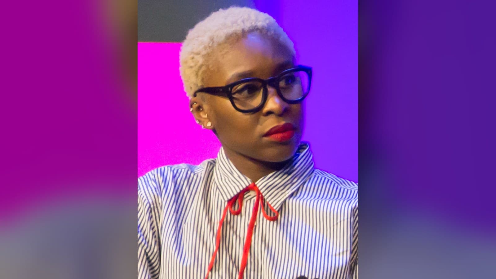 Cynthia Erivo in glasses and a striped shirt at a 2018 panel.