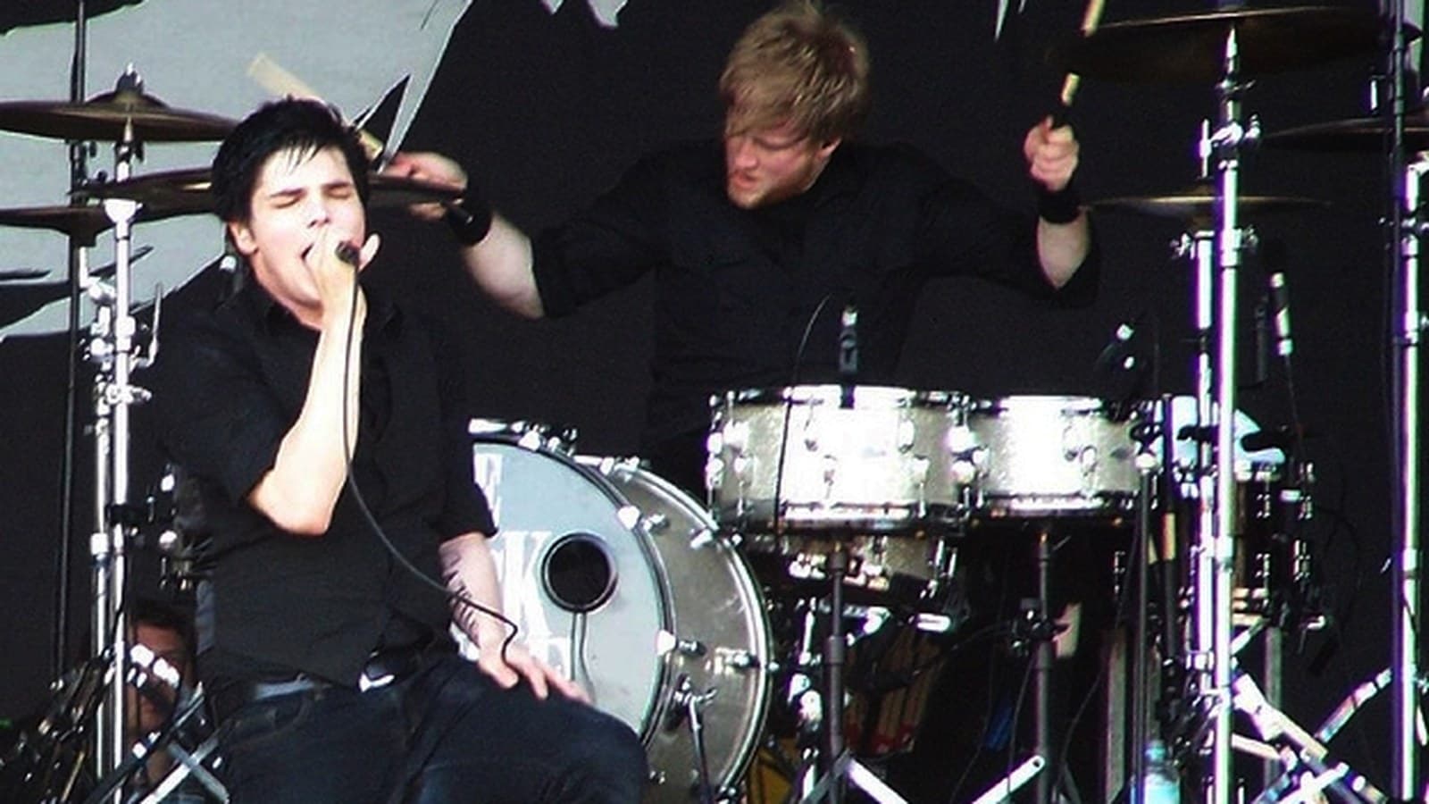 My Chemical Romance singer and drummer performing on stage in 2007.