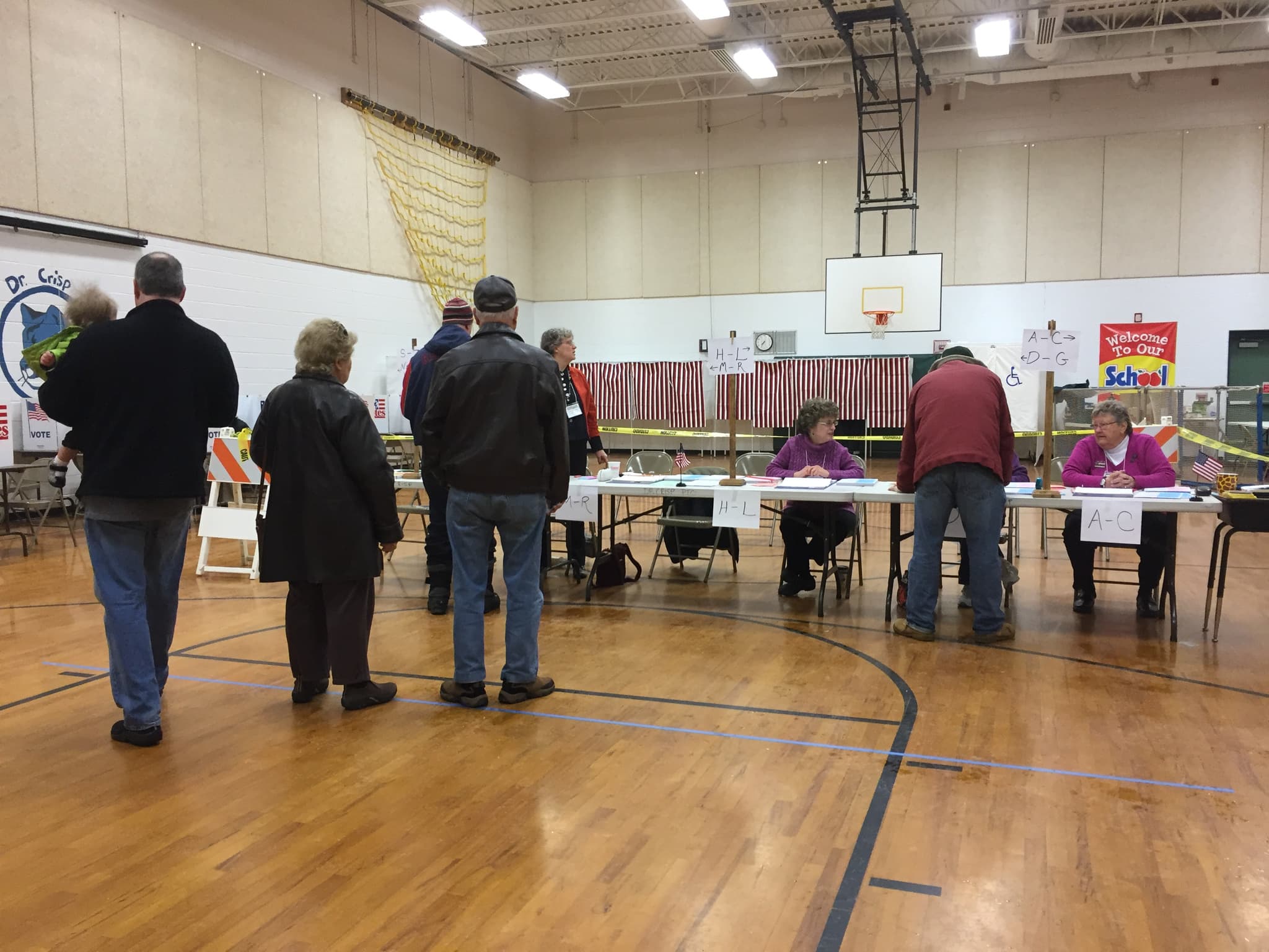 Archive photograph of a polling place in Nashua, New Hampshire, on February 9, 2016; illustrative voting context, not October 2026 or the states in this guide.