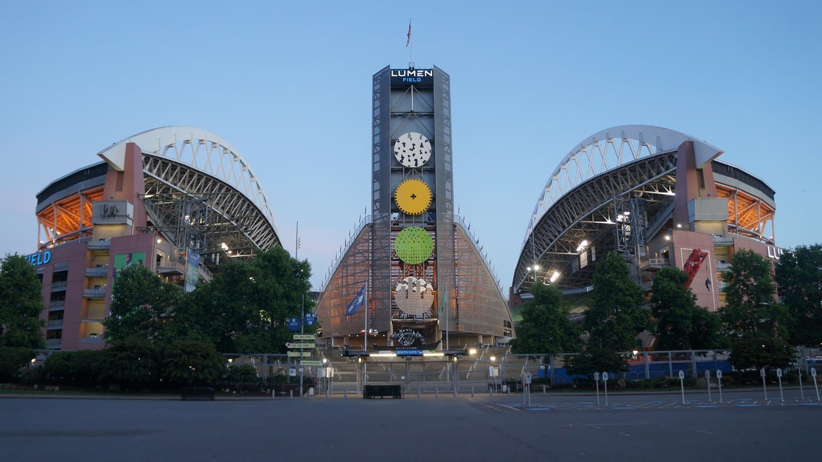 The north side of Lumen Field in Seattle at dusk, with the stadium's two roof arches and its entrance tower, in a 2022 archive photo.