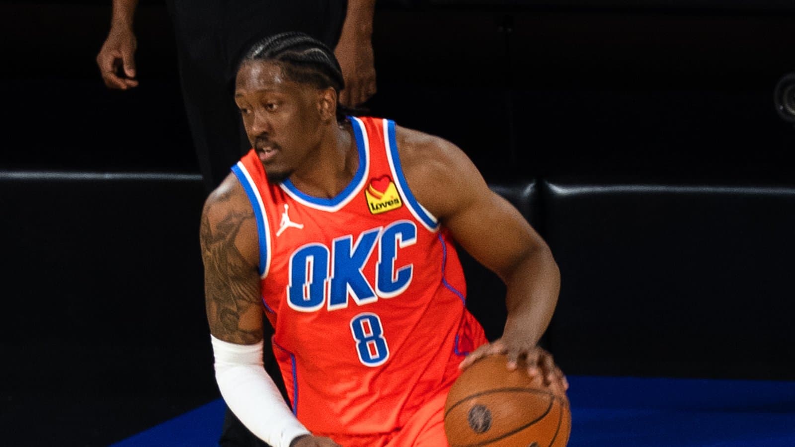 Jalen Williams of the Oklahoma City Thunder, wearing an orange OKC No. 8 jersey, dribbles the ball at the 2025 NBA Cup in Las Vegas in a December 2025 archive photo.