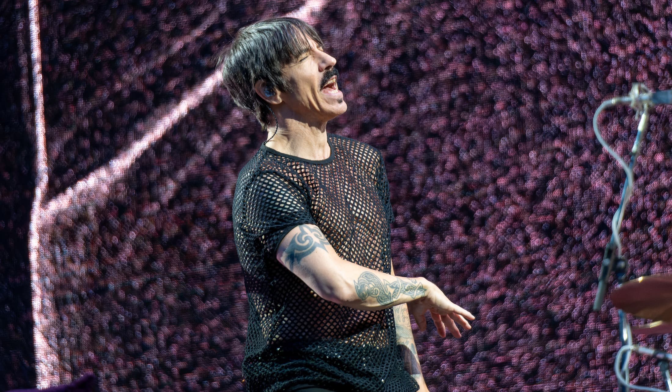 Red Hot Chili Peppers vocalist Anthony Kiedis performing at a London stadium concert in 2023.