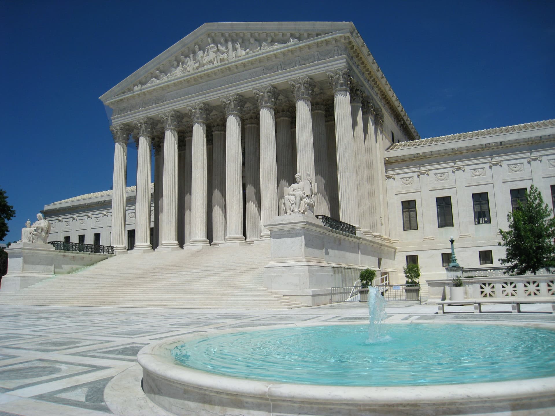 Archival photograph of the U.S. Supreme Court exterior and fountain